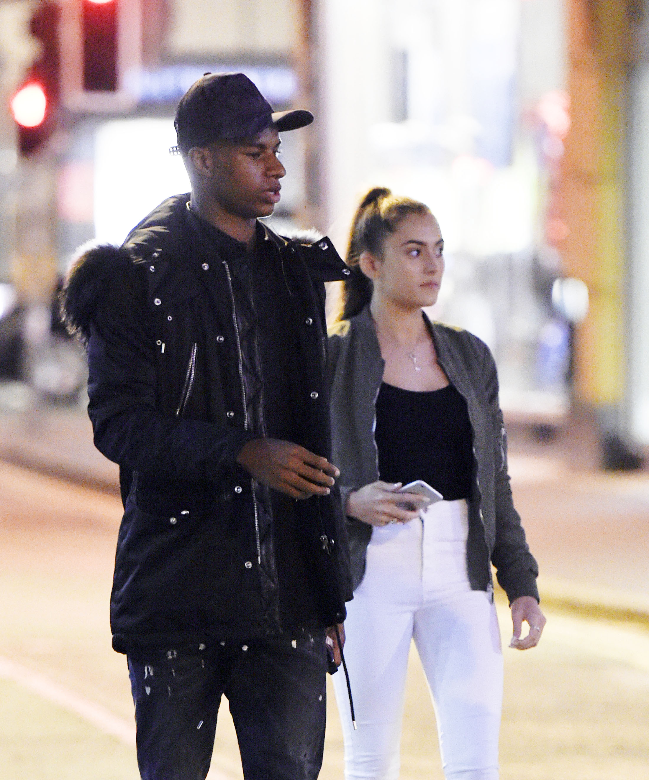  Mystery brunette and Marcus Rashford as they take a stroll in Manchester