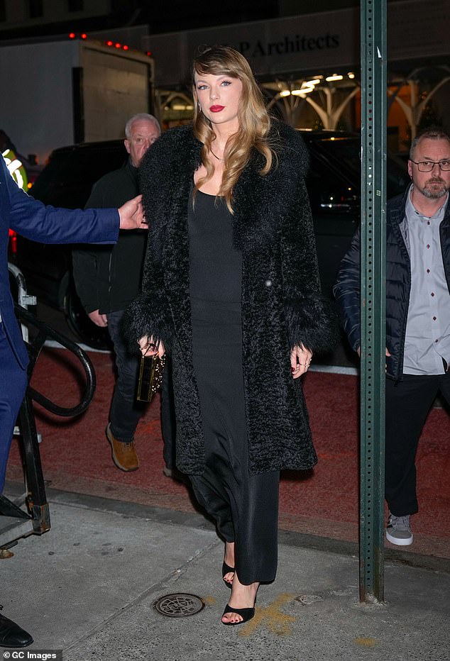 For Wednesday's occasion, Swift stunned in a glamorous black fur coat by Charlotte Simone