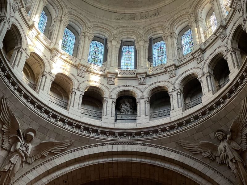 Interior of the Basilica of the Sacré-Cœur, showcasing its magnificent architecture within the Montmartre neighborhood