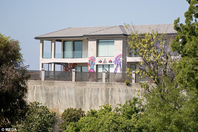 Chris Brown covers enormous wall on LA house with graffiti | Daily Mail Online