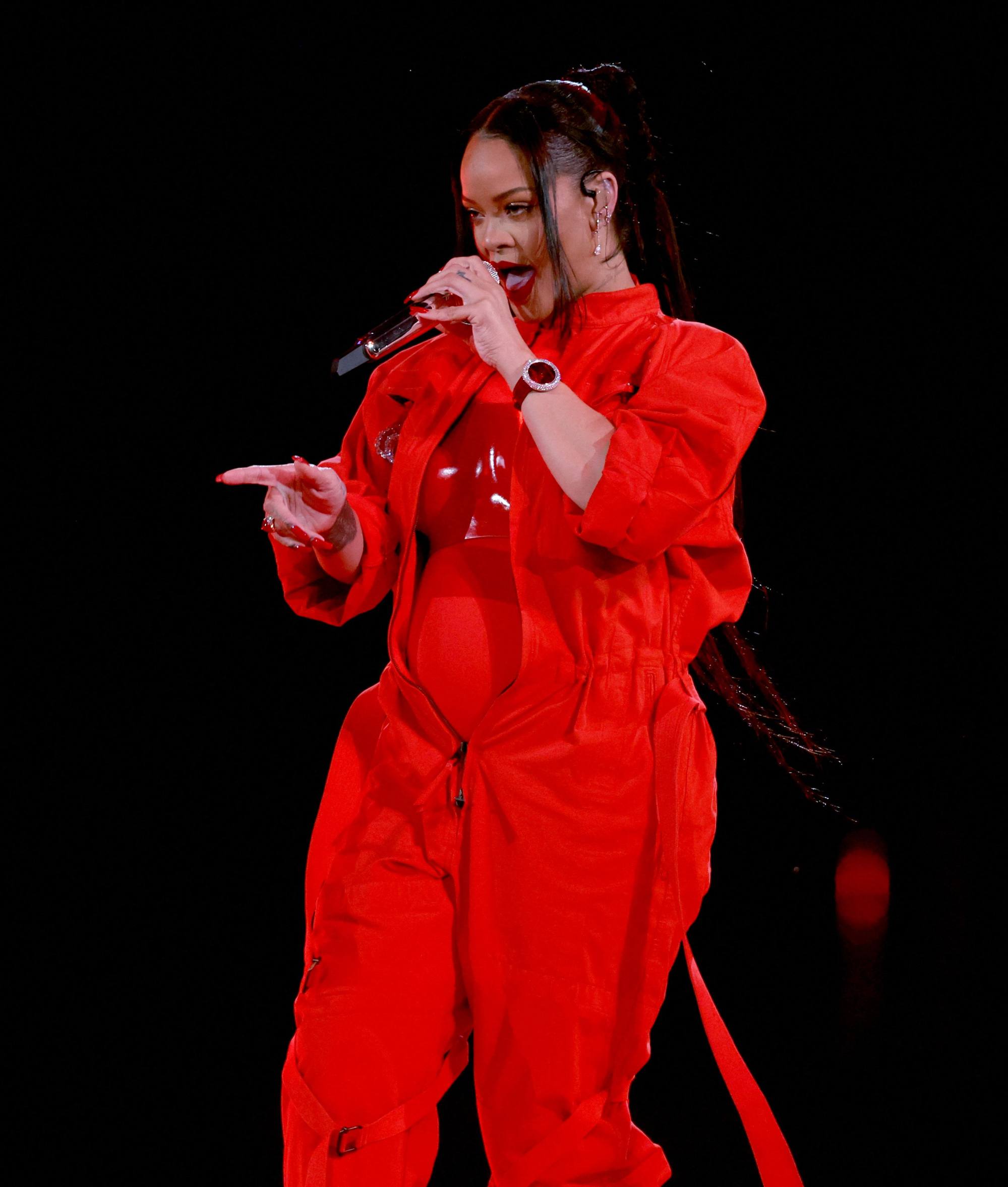 Rihanna's US$72,000 Jacob & Co. Super Bowl watch, revealed: the singer wore a Northern Lights timepiece covered in diamonds and rubies for her NFL halftime show, matching her red Loewe jumpsuit |