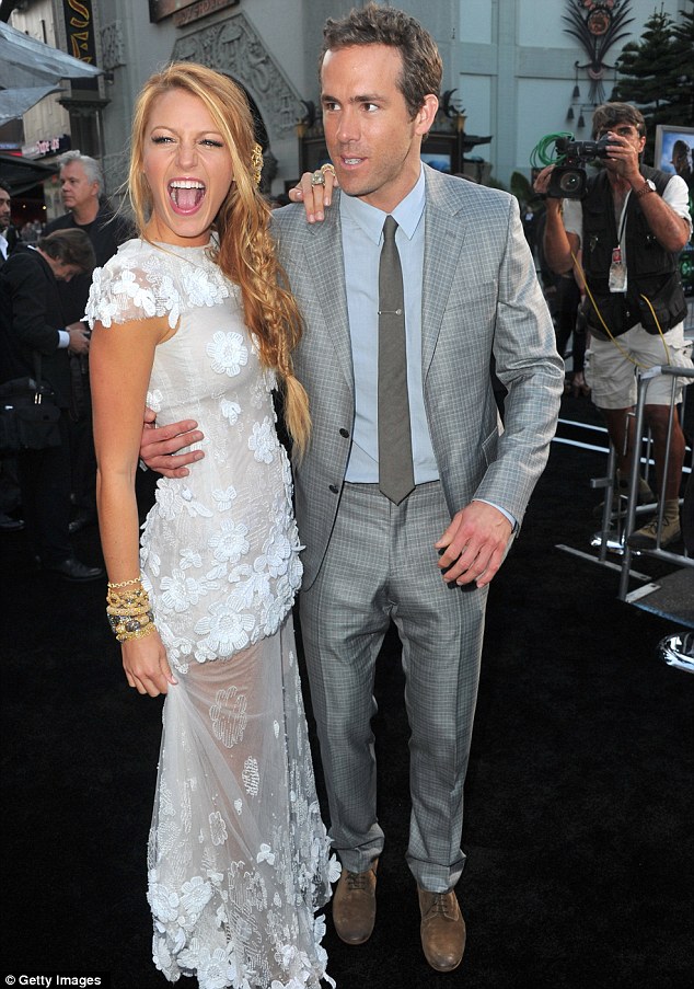 Having a great time: Blake poses with her co-star  Ryan Reynolds