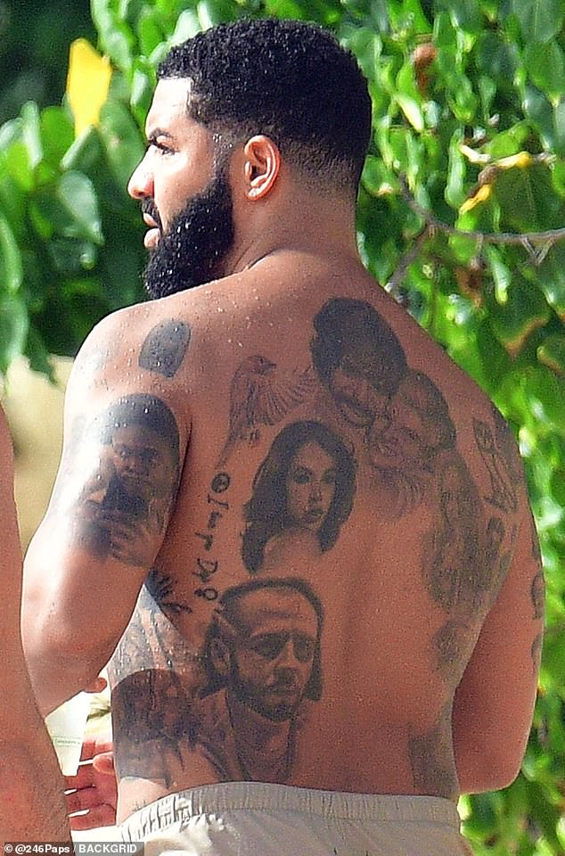 Drake shows tattoo collection with inkings of his producer, family, Lil Wayne, and Sade in Barbados | Daily Mail Online