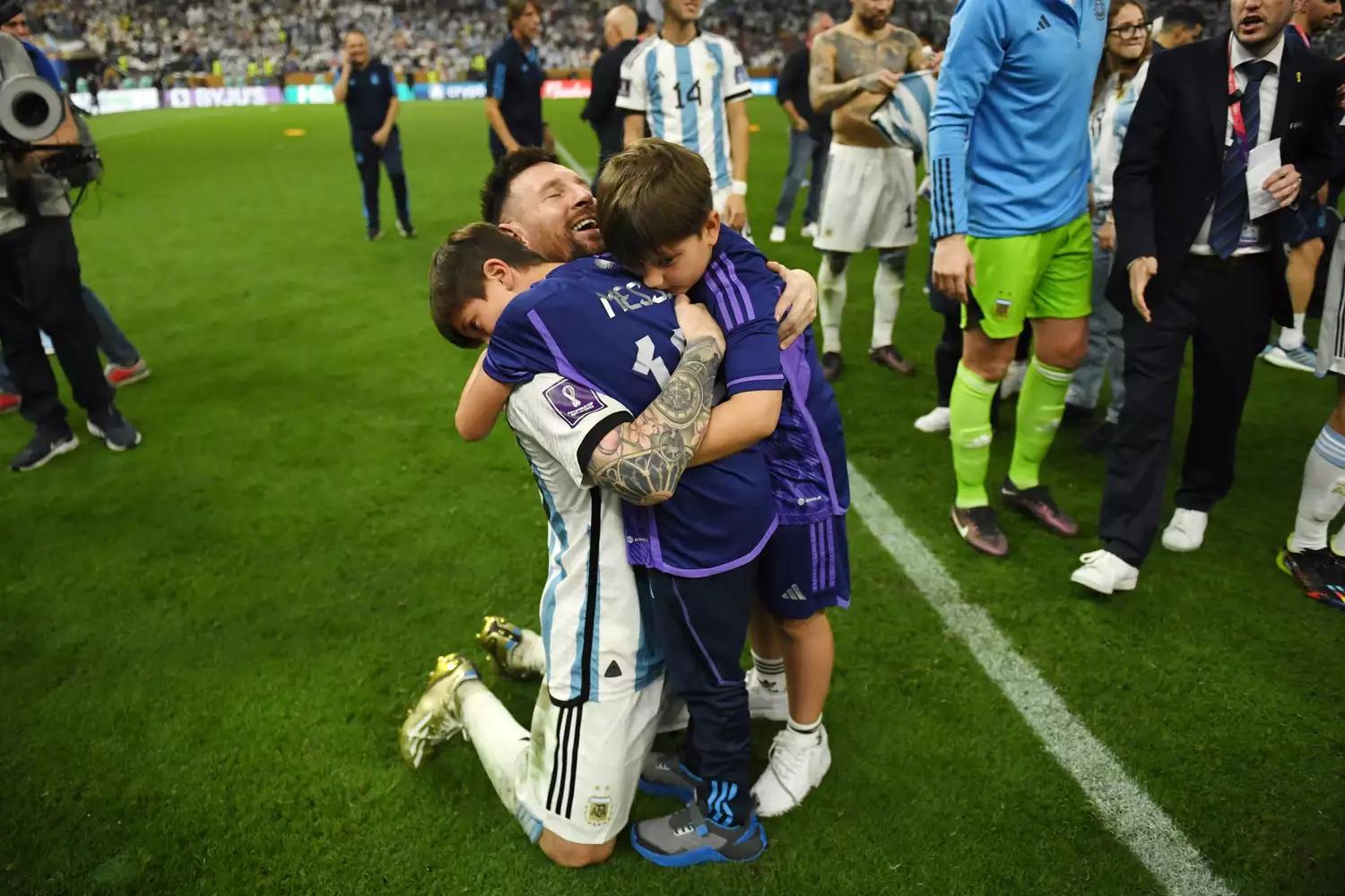 LUSAIL CITY, QATAR - DECEMBER 18: Lionel Messi of Argentina celebrates with his children after the victory in the penalty shoot out during the FIFA World Cup Qatar 2022 Final match between Argentina and France at Lusail Stadium on December 18, 2022 in Lusail City, Qatar. (Photo by David Ramos - FIFA/FIFA via Getty Images)