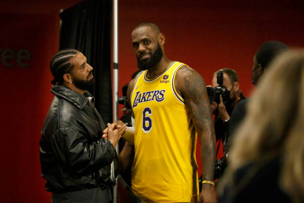 Drake and LeBron James of the Los Angeles Lakers talk after the NBA game between the Toronto Raptors and the Los Angeles Lakers at Scotiabank Arena...