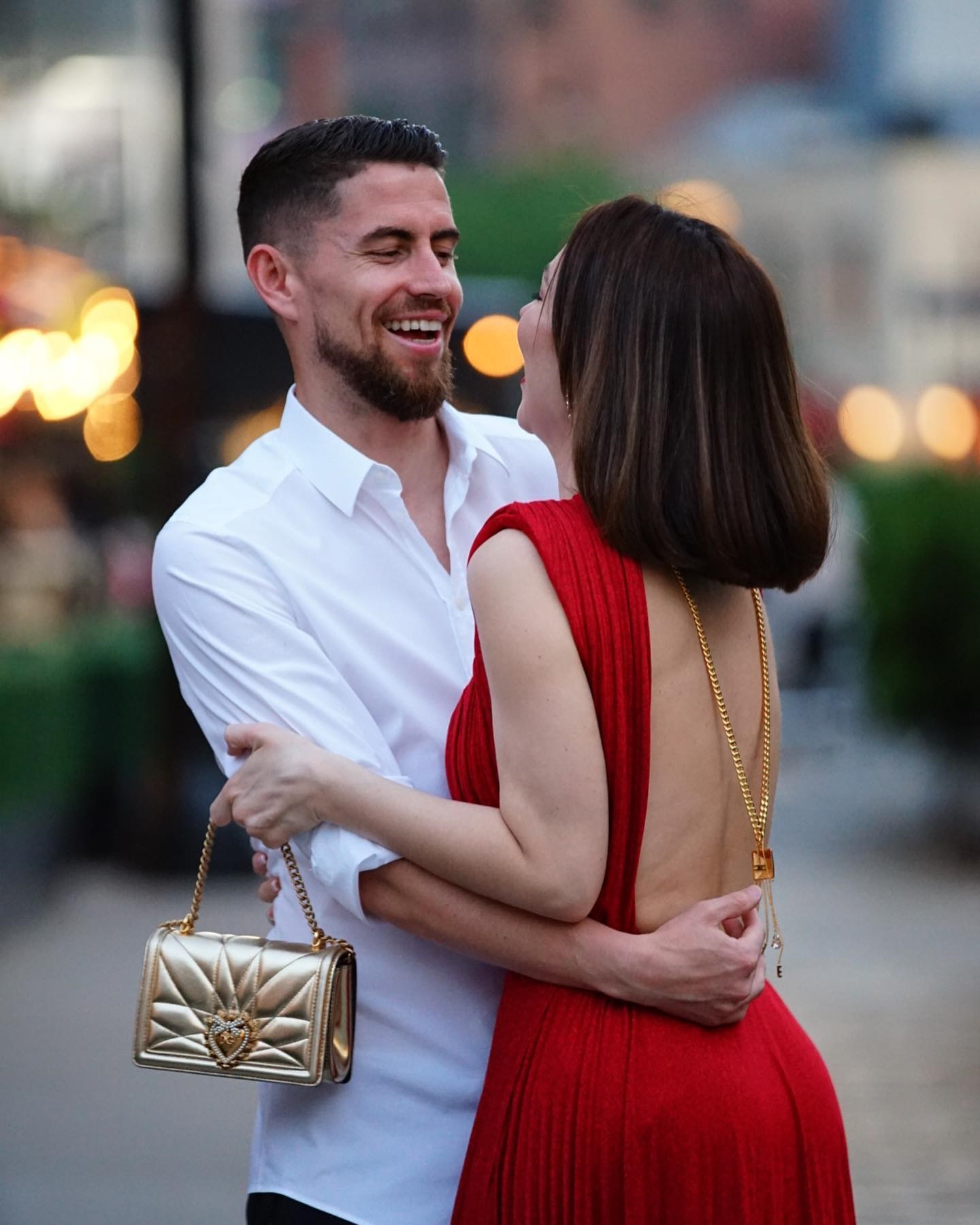 The happy couple pose for a picture