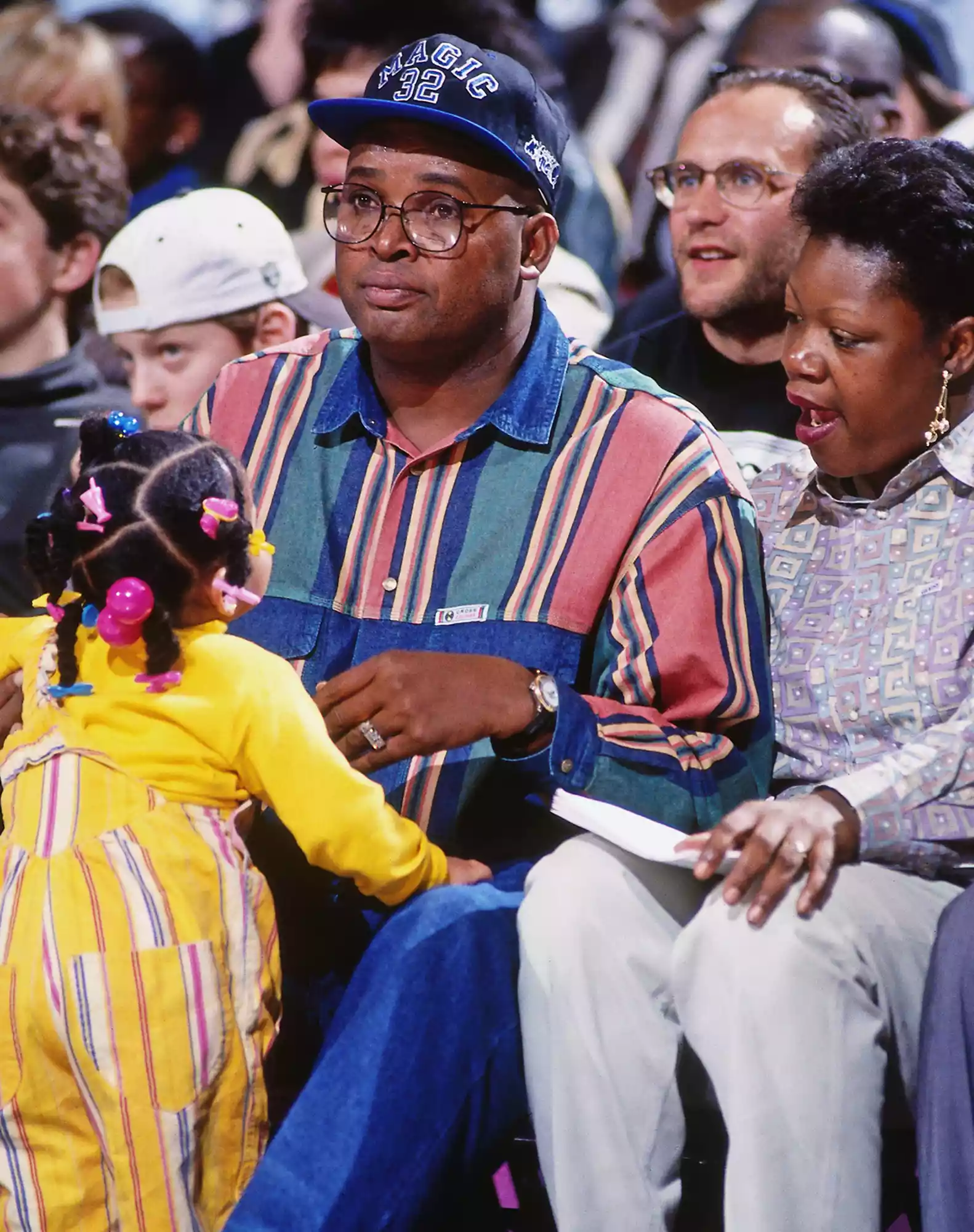 Phillip Harrison sits courtside during a game played circa 1993 at the Orlando Arena in Orlando, Florida.