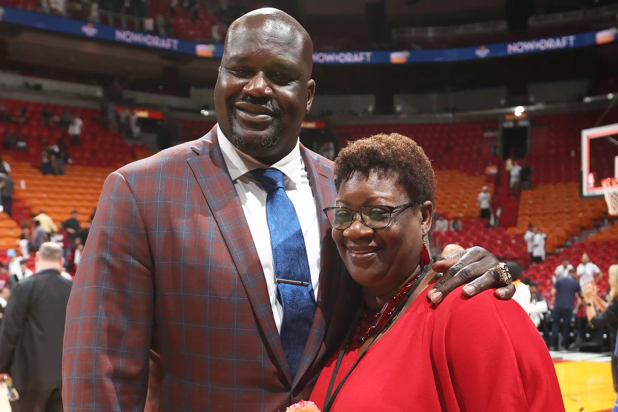 Shaquille O'Neal poses with his mother Lucille O'Neal before being honored at his number retirement ceremony on December 22, 2016.