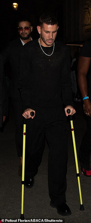 PSG player Lucas Hernandez arrives at the venue on crutches after his ACL injury