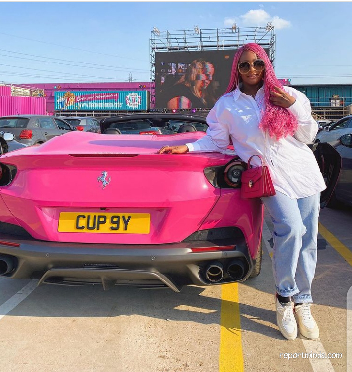 DJ Cuppy show off her pink Ferrari with customized license plate as she steps out for the first time since lock down - Report Minds