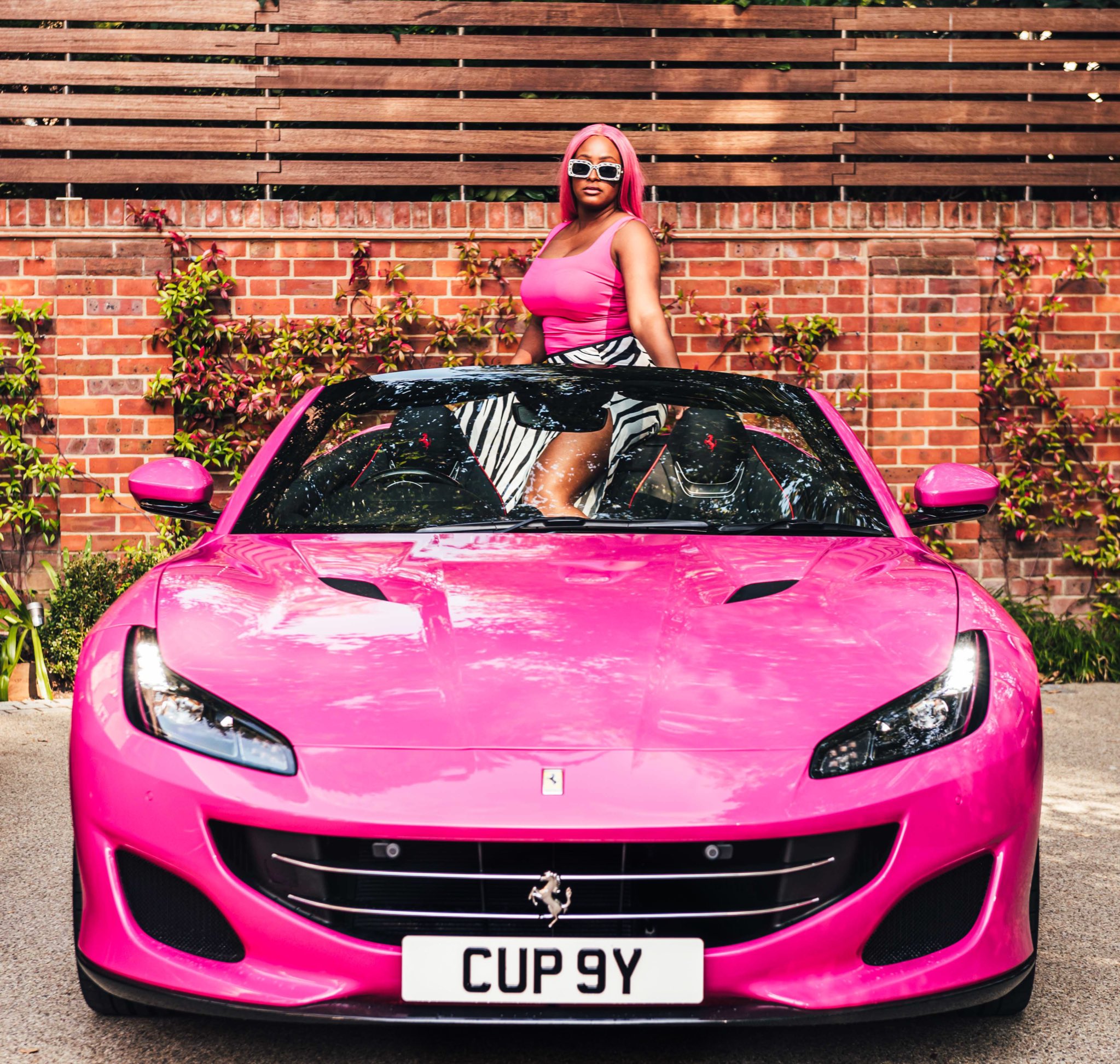 DJ Cuppy brags about luxury cars says, 'Ferrari for London, Aston Martin for Monaco' - Punch Newspapers