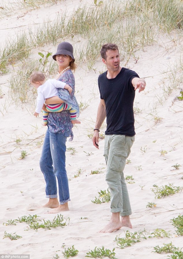 Family stroll: The two movie stars enjoyed a walk among the dunes