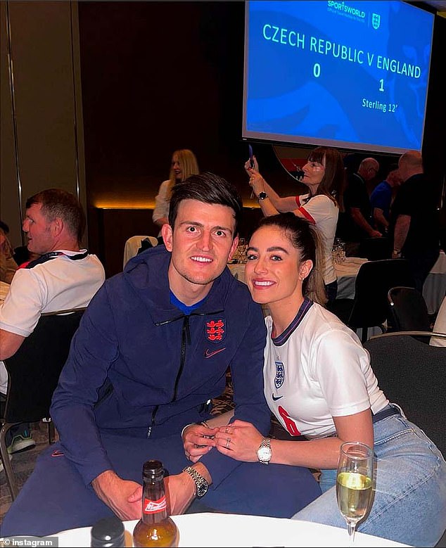 Manchester United's Harry Maguire is seen here with partner Fern Hawkins during Euro 2020