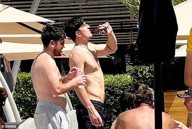 England and Manchester United defender Harry Maguire (right) has been seen holidaying in Turkey after missing out on selection for this summer's European Championship in Germany