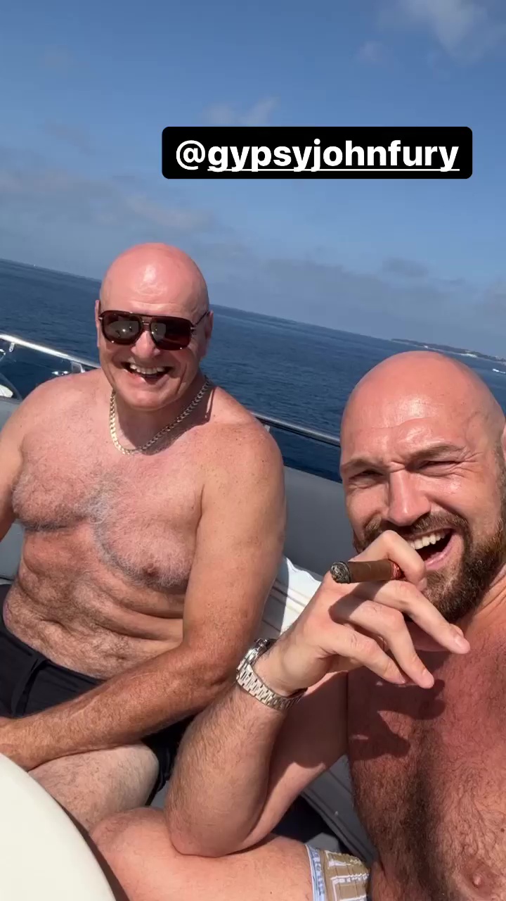 Tyson Fury smoking cigars on a yacht with his dad John Fury