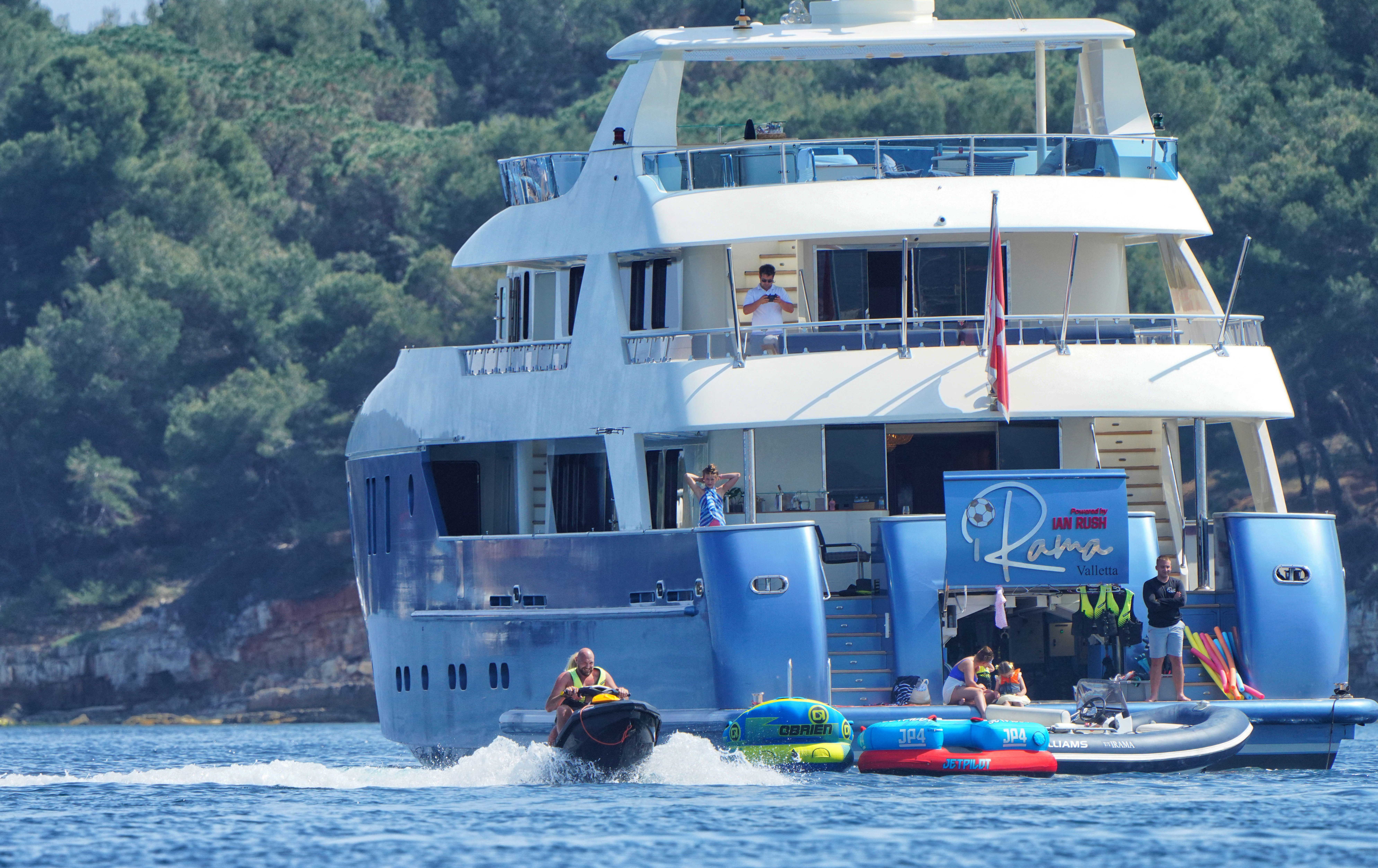 Tyson and Paris can be seen taking a jet-ski out, with the enormous yacht behind