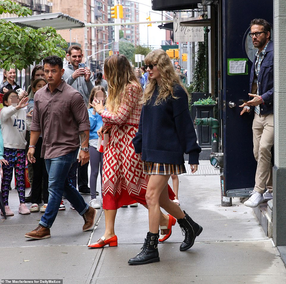 Humble: Blake, who was sporting a red-and-white ensemble with matching Nomasei loafers, waved to young starstruck fans as she left the party