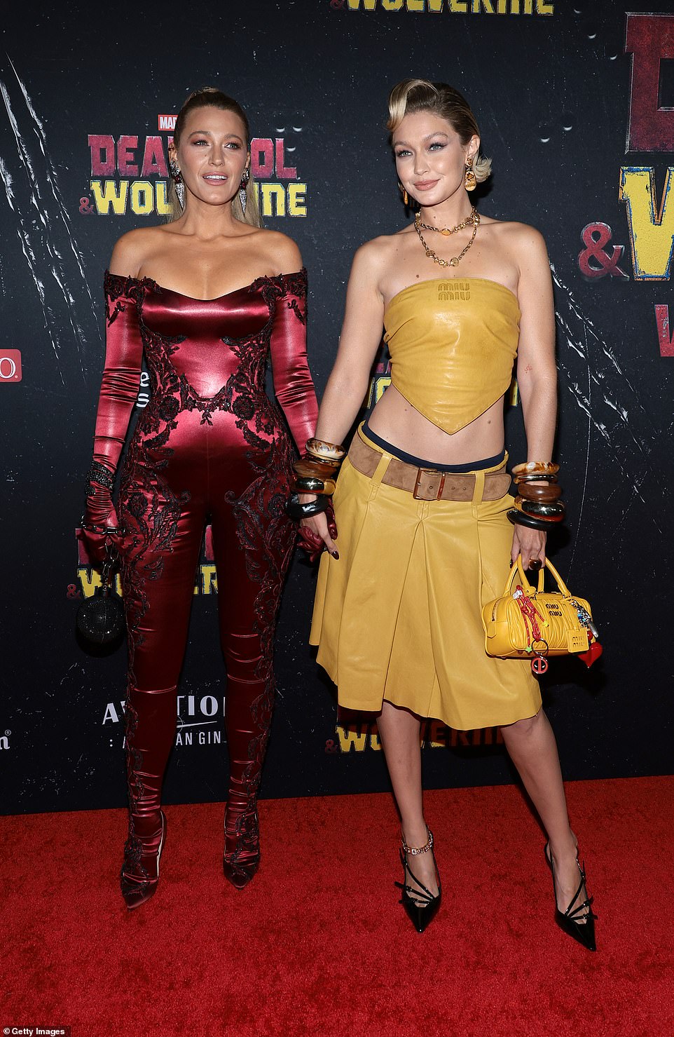 For the New York City premiere of Deadpool & Wolverine, the actress, 36, slipped into a figure-hugging, off-the-shoulder jumpsuit as she posed alongside supermodel pal, Gigi Hadid, 29