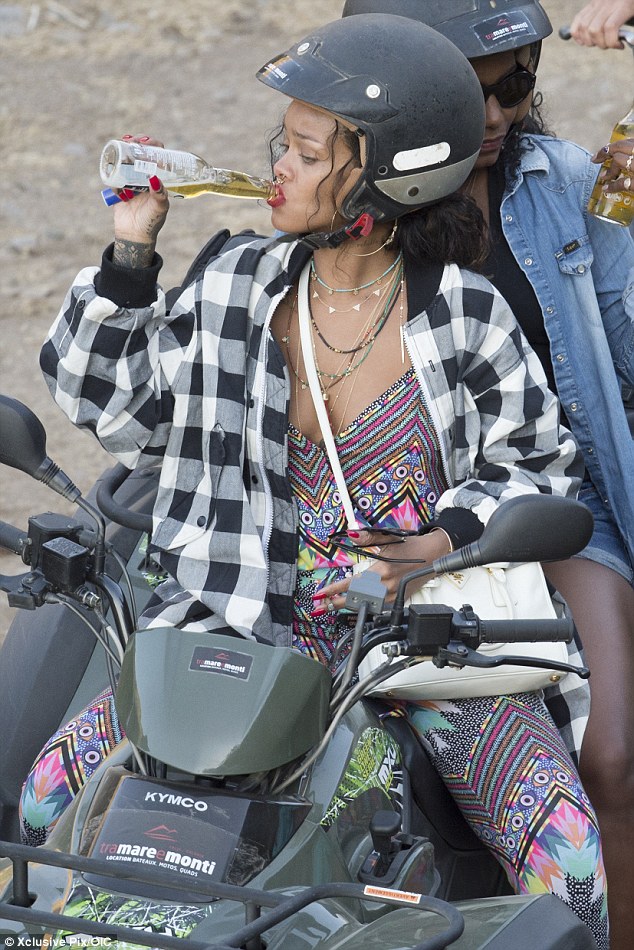 Rihanna sips beer AND puffs on a roll-up as she goes quad bike-on  Mediterranean getaway | Daily Mail Online