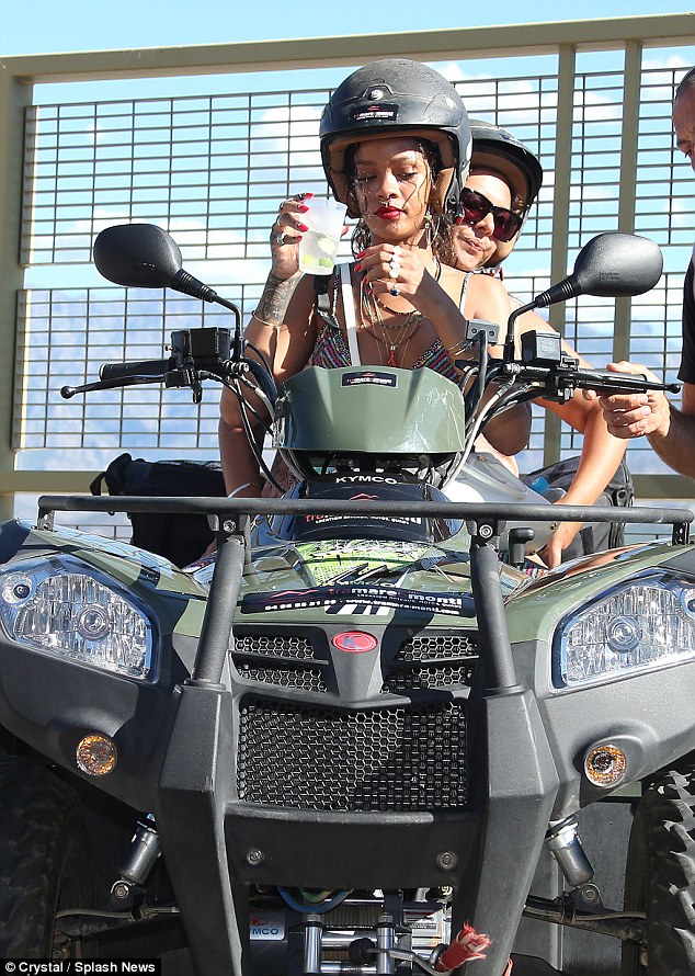 Rihanna sips beer AND puffs on a roll-up as she goes quad bike-on  Mediterranean getaway | Daily Mail Online